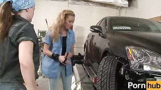 Apprentice lesbian beauties work on cars and get their cunts licked in the garage
