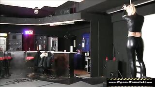 A woman has sex with two guys at the same time wearing latex