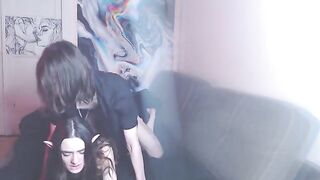 A couple enjoys intimate moments while listening to music, creating their own rhythm