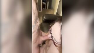 The wife is having fun with tattooed guy while her husband is at work