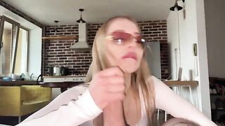A pretty woman with glasses got a messy, hot cumshot on her face