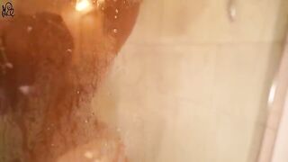 Young cute babe caresses her sweet pussy in the shower