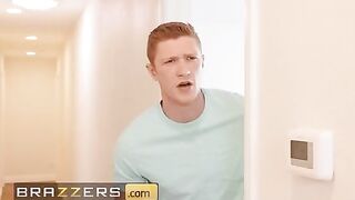 Mellanie Monroe gets stuck while setting up the laundry rack, so her stepson helps her out