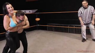 Nadia White, the busty brunette, dominates her opponent with her juicy ass in a fierce match