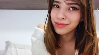 A hot girl masturbates using a vibrator in a steamy session