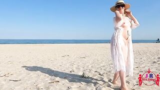 A first-time nude pose on a public beach and the experience of outdoor sex