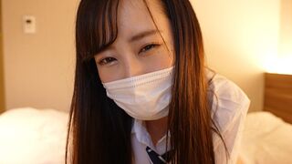 A Japanese school uniformed girl strokes a guy's cock with her hand