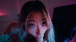 A sexy Asian teen, Raya Steele, massages and gives an intense blowjob
