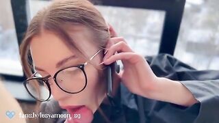 A woman talks on the phone with her husband while her friend is fucking her