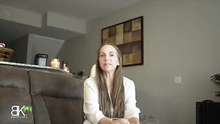 Stepmom and stepson share a couch in a taboo roleplay