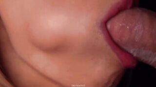Horny babe sucks dick through a condom and gets cum in her mouth