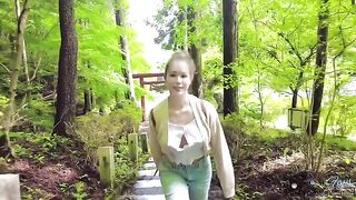 A couple gets crazy while hiking in the rain and fucks outdoors