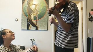 The couple was trying to practice violin when things got steamy