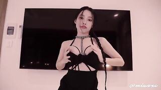Hot Asian girl in a black dress, high heels, squirts and cum inside her