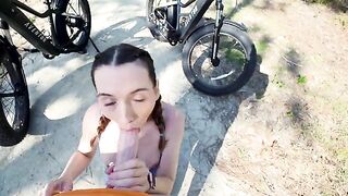 Small girl shows her boyfriend the sights of the city on a big bike