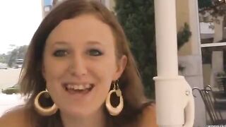A brunette woman has sex on the bed without any clothes
