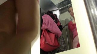 A peeping guy filmed a girl in the locker room of the shop