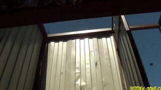 A woman was secretly filmed in a beach cabin, showcasing unexpected intimate moments