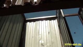 A woman was secretly filmed in a beach cabin, showcasing unexpected intimate moments