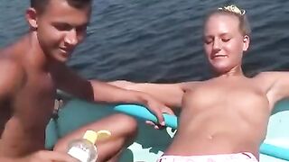 Sexual young people are having fun on the riverbank