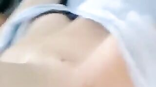 A half-naked lie and stroking her body with her hands in the video