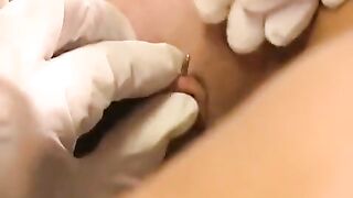 Babe with a clitoris piercing plays with sex toys