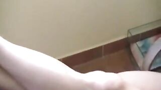 A naked girl with a burning cigarette got absorbed