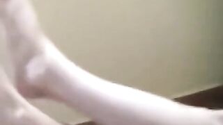 A naked girl with a burning cigarette got absorbed