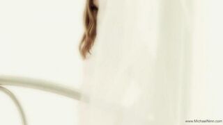 A young and pretty beauty is indulging in solo pleasure