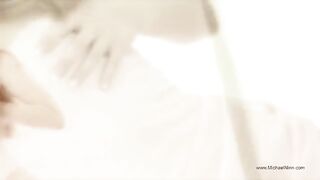 A young and pretty beauty is indulging in solo pleasure