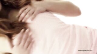 A young and pretty beauty is indulging in solo pleasure