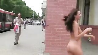 A hot brunette with a great figure exposes herself in public for money