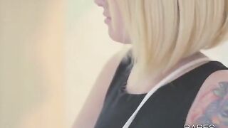 A sexy tattooed girl plays with her body and moans in orgasmic pleasure