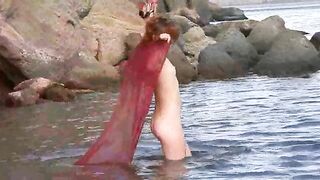 A hot girl walked outside naked and got wet, it was awesome