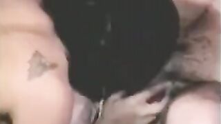 The guy was fucking a strapon, while another girl was fingering his dick with her hand