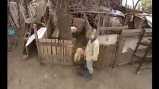 A Russian slut is having fun with a guy in the village