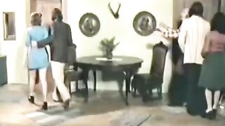 A charming girl has sex with four guys in a retro scene