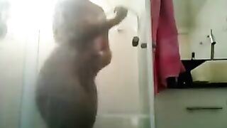 The huge ass franchise was barely framed in the shower, a steamy scene