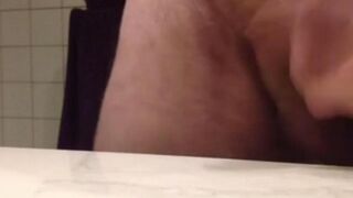A man came to work and started masturbating his dick right on the table