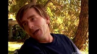 A young beautiful girl is having fun with a guy in nature