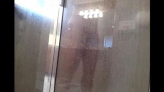 The guy washes in the shower, but he does not know that he is being filmed