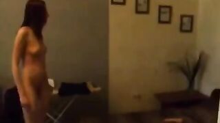 A cute Russian girl caresses herself in the kitchen, feeling pleasure