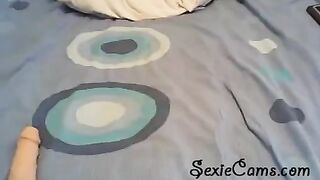 Toying herself on webcam with various sex toys in front of the camera
