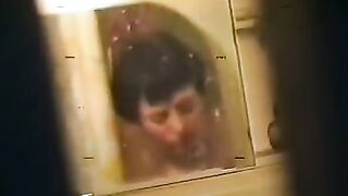 A drunken woman was having a bath, when a soldier came in