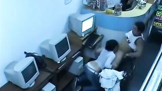 A young man masturbates his cock in the internet cafe