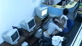 A young man masturbates his cock in the internet cafe