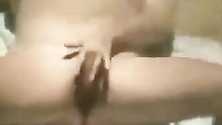 A girl was masturbating on the beach and she did not notice a camera