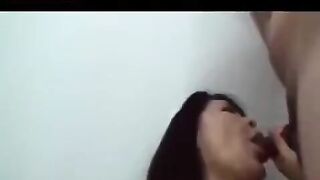 A mature Japanese guy plays with his cock and gives a blowjob
