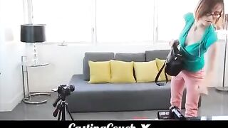 Brunette woman at the porn casting, she has small boobs and glasses
