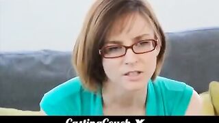 Brunette woman at the porn casting, she has small boobs and glasses